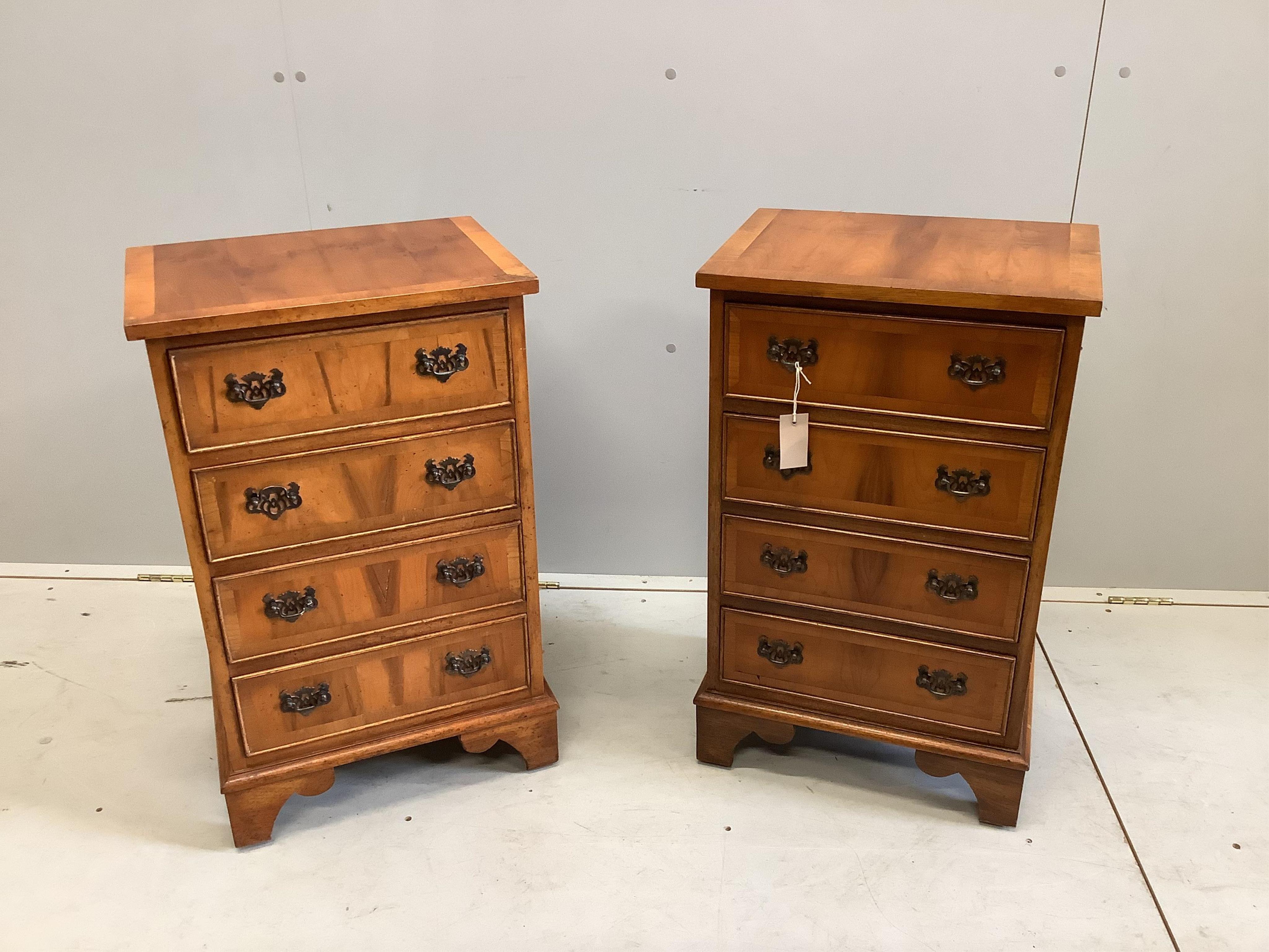 A pair of Queen Anne Revival walnut four drawer bedside chests, width 44cm, depth 32cm, height 74cm. Condition - fair